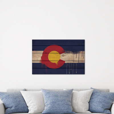 " Colorado Paint Drip State Flag On Wood Planks " by ICanvas