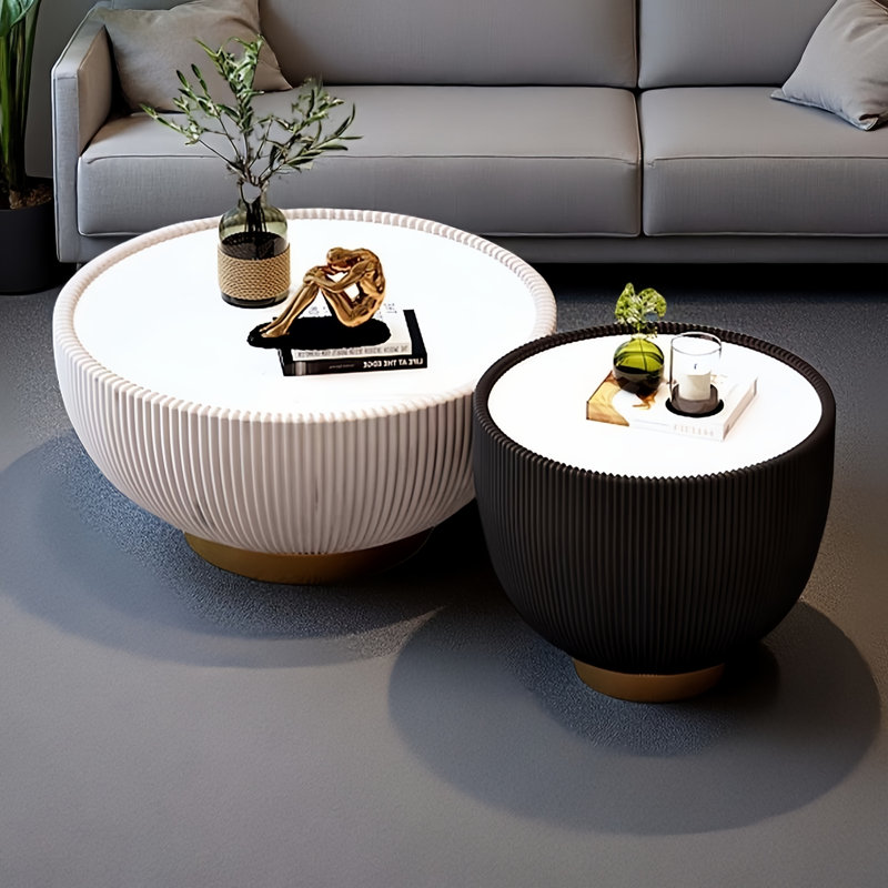 Ensemble de tables basses noires et blanches en forme de bol