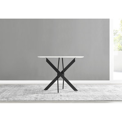 Tierra Sleek Black Metal and White Gloss Round Dining Table Set with 4 Luxury Velvet Dining Chairs