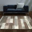 Tapis bleu clair et ivoire tissé à la machine 7 pi x 9 pi Patchwork
