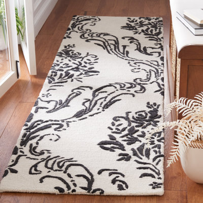 Tapis floral beige / ivoire en laine / coton touffeté à la main Esjay