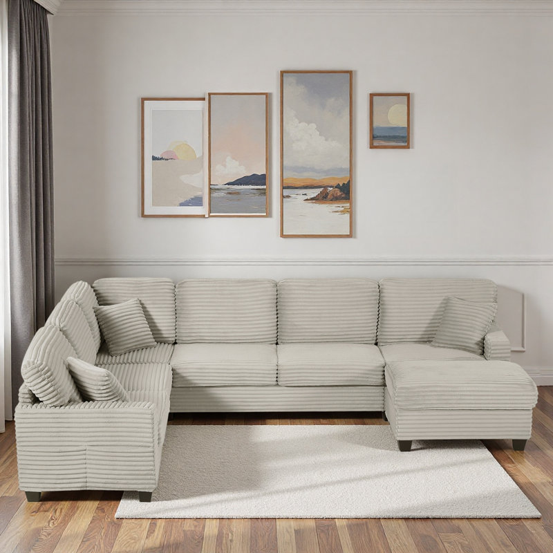 Canapé modulaire avec repose-pieds mobile et poches de rangement latérales
