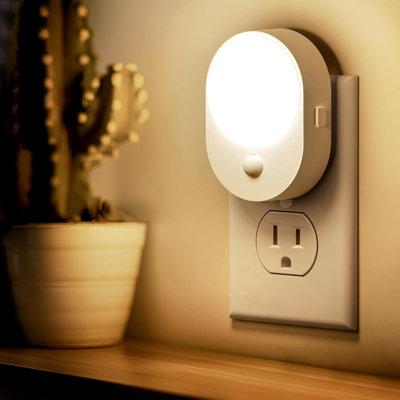 Oval White Plug-In Night Light With Motion Sensor, 3000K Warm White, 3-Level Dimmer