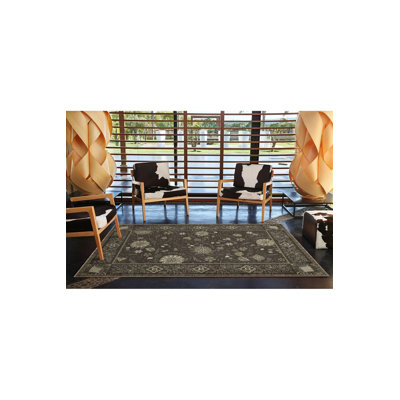 Tapis tissé à motif floral noir lavable