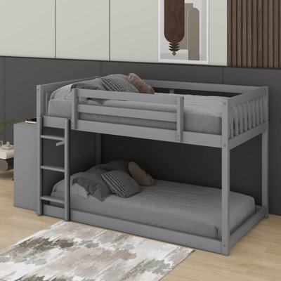 Lit superposé simple au-dessus de simple avec 3 tablettes et 4 tiroirs