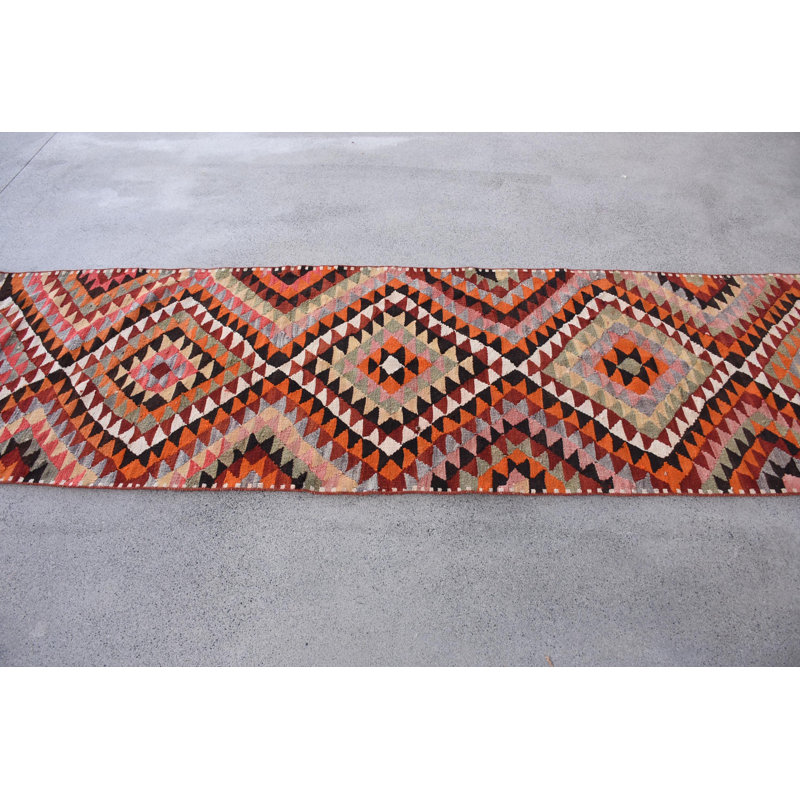 Tapis rouge élégant en laine Kilim