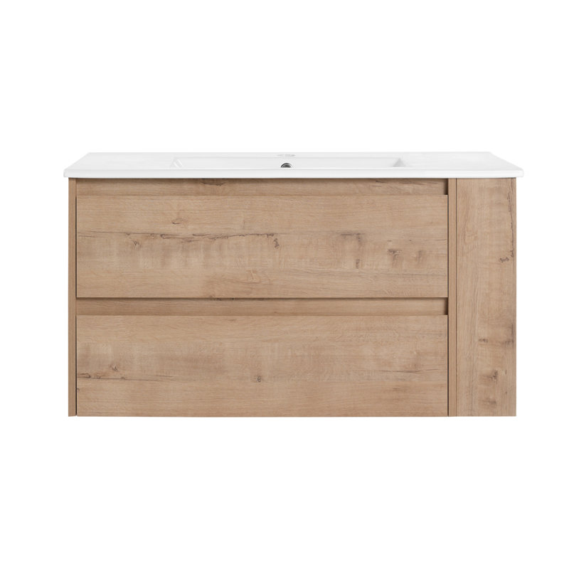 Meuble-lavabo mural de 36 pouces avec lavabo en céramique et tiroir à fermeture en douceur, parfait pour les salles de bain modernes et un rangement efficace.