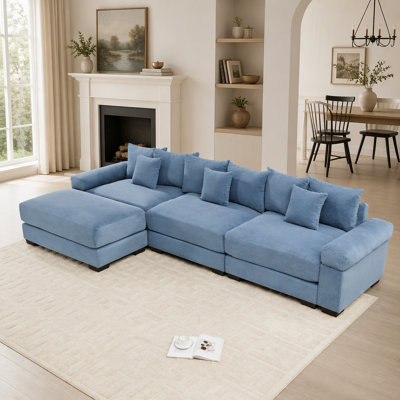 Canapé d'angle modulaire Cloud surdimensionné de 330 cm (130 pouces), en velours côtelé doux, avec pouf, assise profonde, larges accoudoirs, design ergonomique, 9 coussins, montage facile, pour salons et chambres, couleur crème.