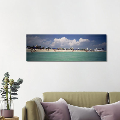 Tourists On The Beach, Miami, Florida, USA by Panoramic Images - Wrapped Canvas Panoramic Print