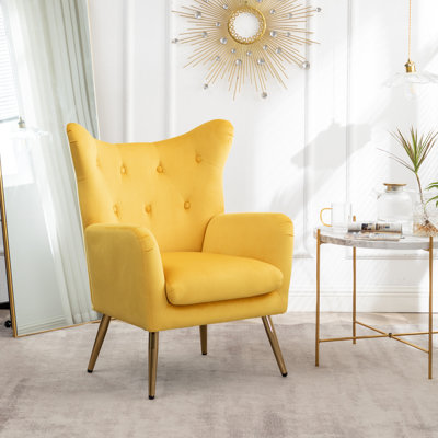 Fauteuil d'appoint en velours capitonné