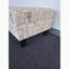 Repose-pieds avec rangement relevable