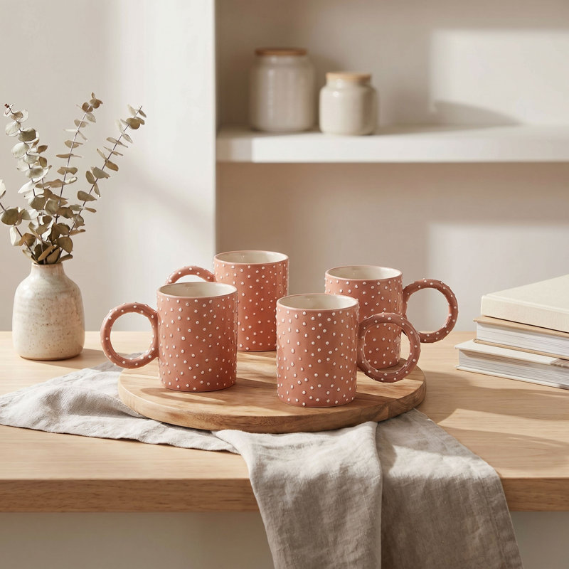 Tasse en grès rose à pois artisanaux