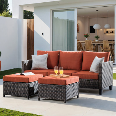 Eaker 3 Piece Rattan Sectional Seating Group with Cushions