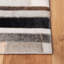 Tapis abstrait noir / ivoire en cuir tissé à la main Shadle-467670214