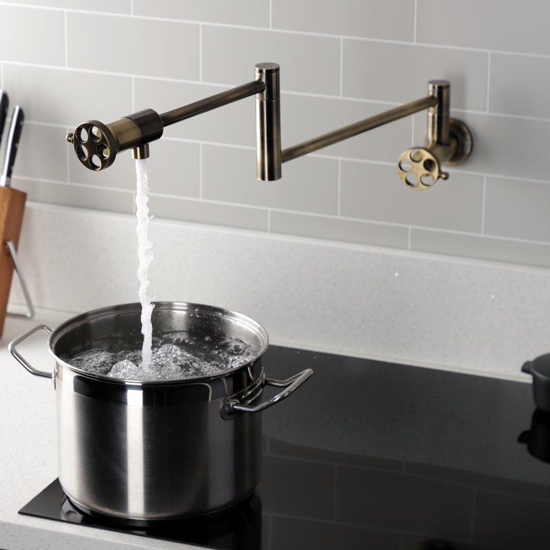 Kingston Brass Wendell Two-Handle 1-Hole Wall Mount Pot Filler Faucet with Knurled Handle, Antique Brass