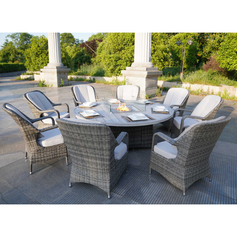Natascha 8 - Person Wicker Patio Dining Set with Round Table , Cushions Included, Grey