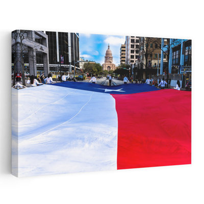 University Of Texas Students Carry Texas Flag Down Congress Avenue, Texas Independence Day Parade To The Texas Capitol. Austin, Texas Abstract Cont...