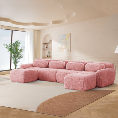 Ensemble de canapé modulaire à quatre places en tissu moelleux moelleux avec repose-pieds, rembourré de mousse haute densité 32D, comprend des coussins décoratifs et convient aux espaces de salon.