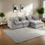 Canapé modulaire spacieux en velours gris antique pour salon moderne