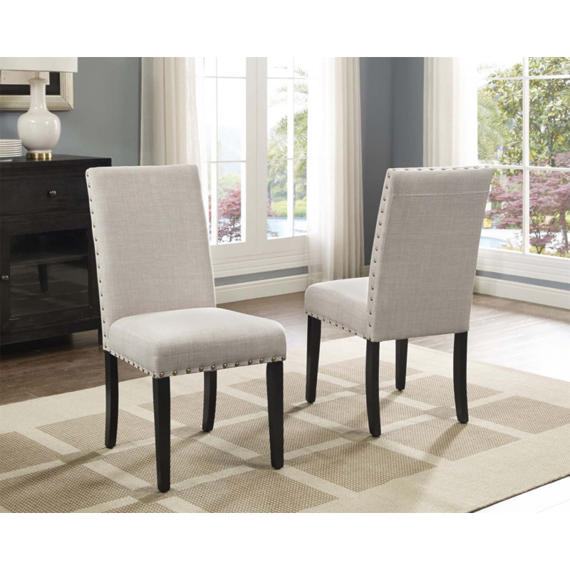 Ensemble de 2 chaises de salle à manger en tissu avec garniture cloutée Biony, élégantes et confortables pour les salles à manger modernes