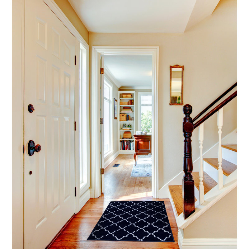 Spiceland Floral Polypropylene Area Rug in Navy
