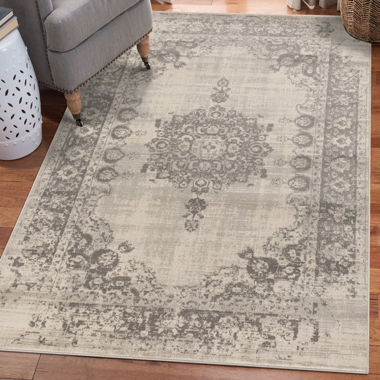 Tapis floral gris