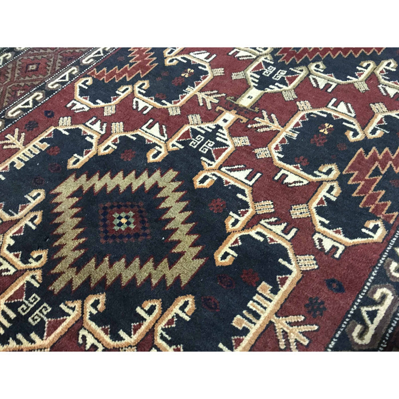 Tapis bleu marine et vin de haute qualité noué à la main