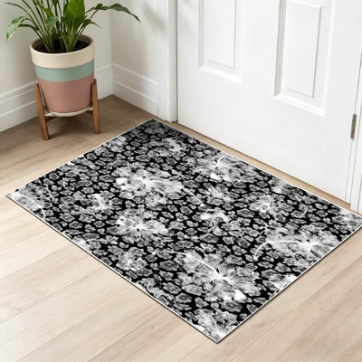 Tapis d'intérieur noir léopard avec fleurs exotiques lavable à la machine