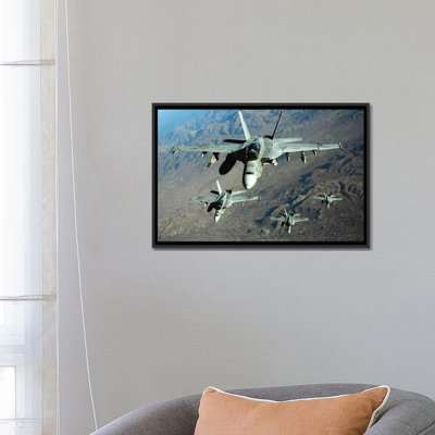 " Four US Navy F/A-18 Hornet Aircraft Fly Over Mountains In Afghanistan " by Stocktrek Images
