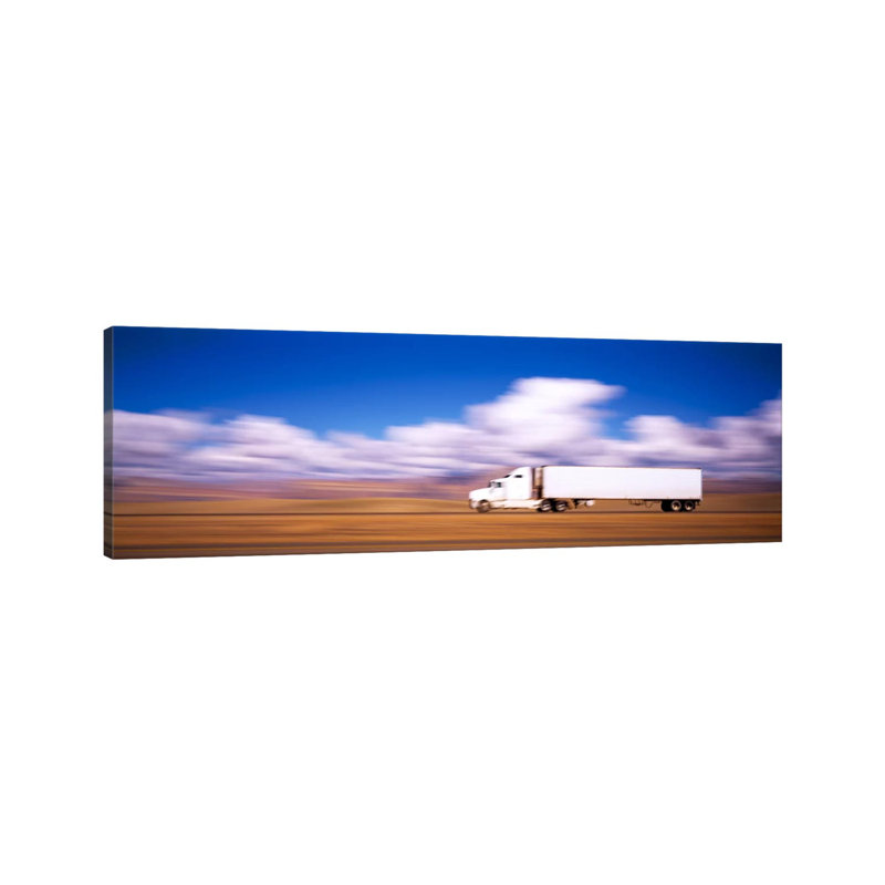 Blurred Motion View Of A Semi Truck, Interstate 70, Near Green River, Utah, USA - Wrapped Canvas Panoramic Print