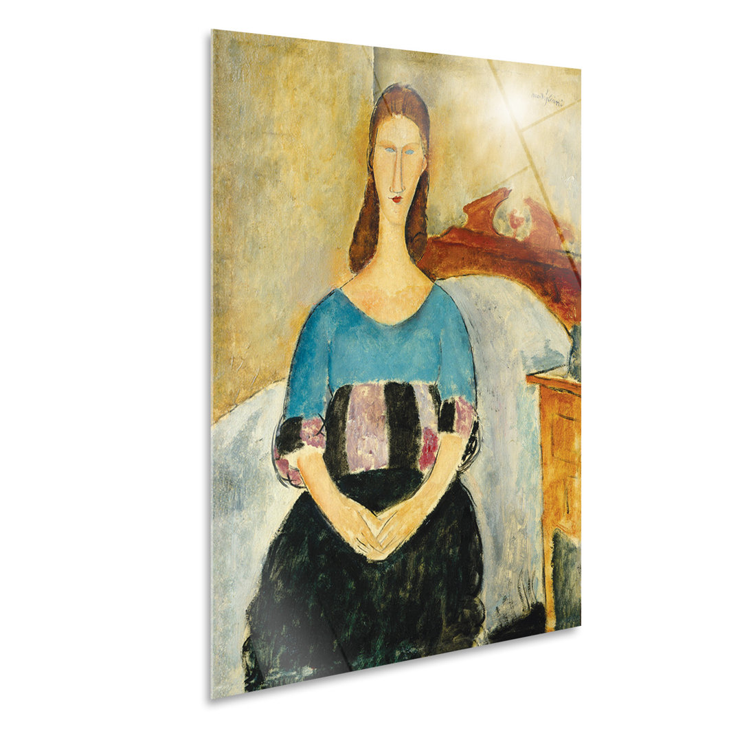 Wandbild Jeanne Hebuterne Auf dem Bett sitzend von Amedeo Modigliani