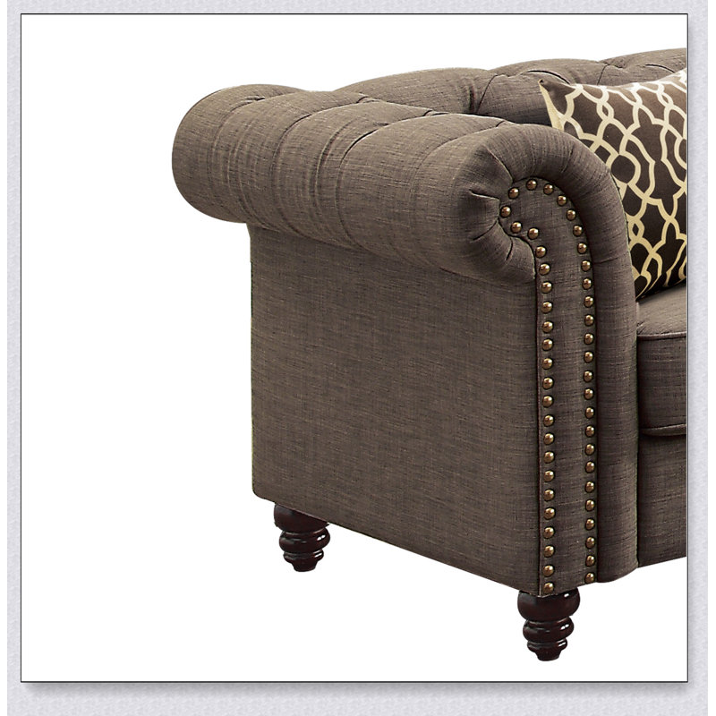 Fauteuil d'appoint brun capitonné avec coussin