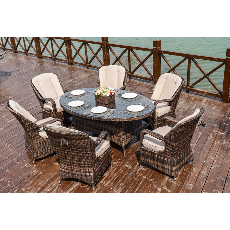 6 - Person Wicker Patio Dining Set with Oval Table , Cushions Included, Brown/Beige