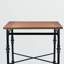 Table de salle à manger Gaylynn à base en métal noir et placage de bois de frêne brun-998587976