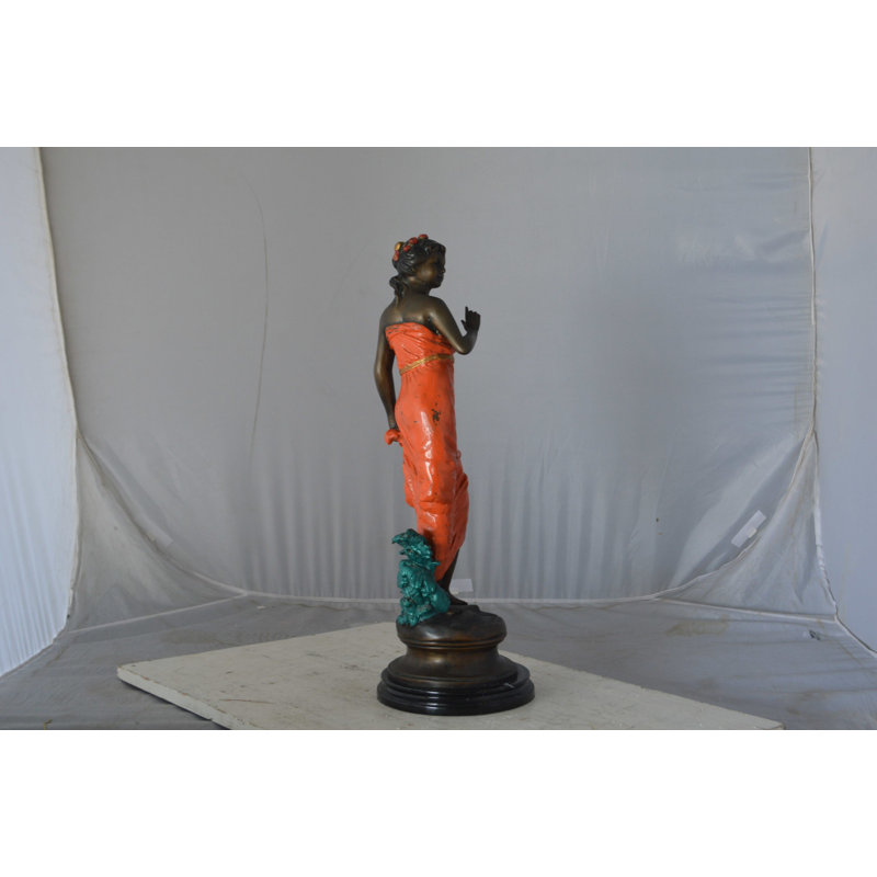 Young Lady In Orange Bronze Statue - Size: 7"L X 26"W X 25"H.