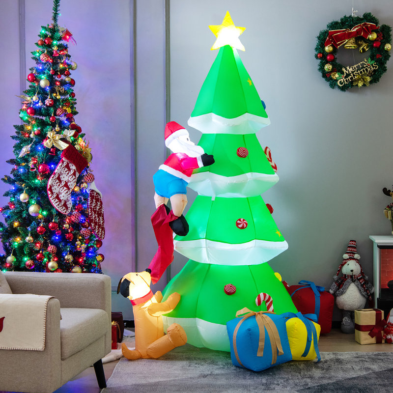 Arbre avec père Noël et chien gonflable