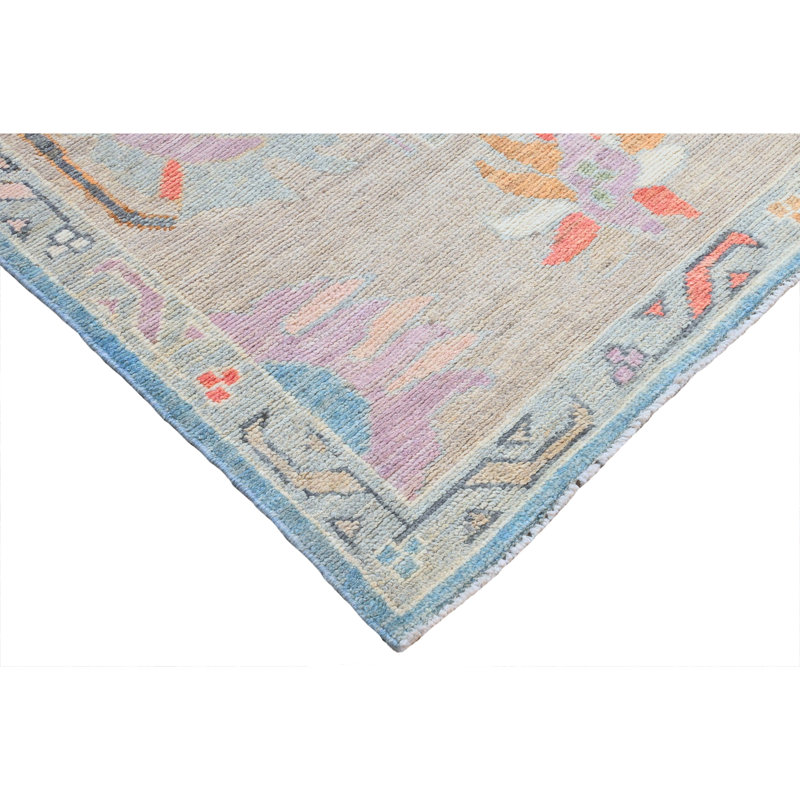 Tapis bleu et multicolore de haute qualité noué à la main