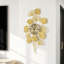 Horloge murale moderne en métal doré à motif feuille de ginkgo (21,65 x 35,43 po)