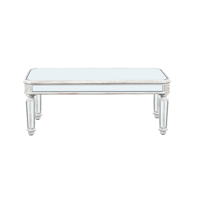 Table basse à miroir argenté avec pieds sculptés rétro, centre de table rectangulaire en verre pour un décor de salon moderne