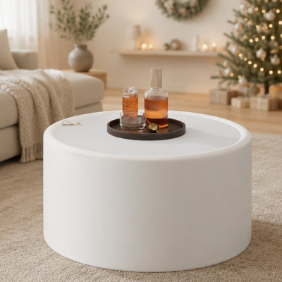 Table basse ronde moderne avec dessus en verre trempé et rangement dissimulé, idéale pour l'organisation d'un salon contemporain.