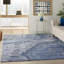 Tapis bleu abstrait touffeté-537889654