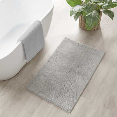 Tapis pour salle de bain réversible Plume