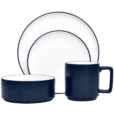 White porcelain stacking dinnerware pieces designed to nest together