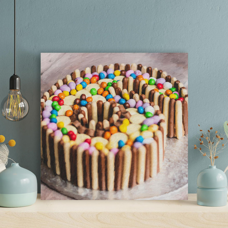 Gâteau enrobé de chocolat avec paillettes sur une surface de béton gris - 1 pièce, impression carrée sur toile tendue