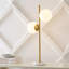 Lampe de table dorée
