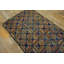 Tapis crocheté antique à motif d'art populaire