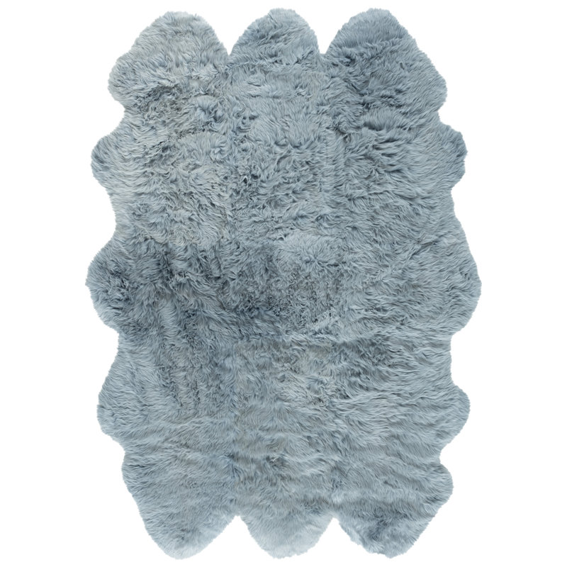 Tapis bleu acier Tateos, Rectangle 5 pi 5 po x 7 pi 7 po