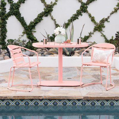 Outdoor Iron Bistro - Create A Relaxing Atmosphere Coral Colored Chairs