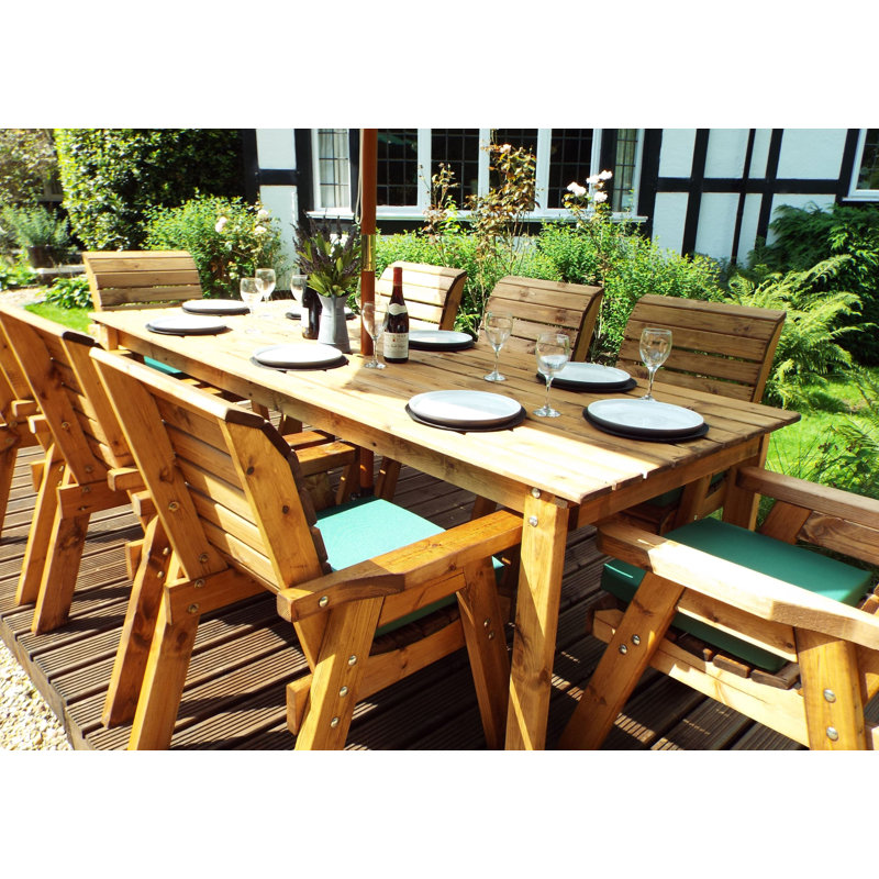 Finney 8 - Person Wood Patio Dining Set with Rectangular Table , Cushions Included, Green