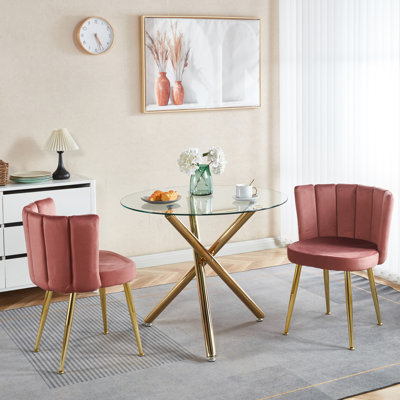 2 chaises de salle à manger roses avec pieds en métal de couleur dorée et velours douillet. Dossier ergonomique. Housse courte en fourrure. Convient à différentes pièces. Assemblage simple (2 pièces) Revêtement en velours tube de fer.
